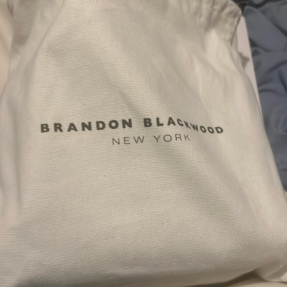 Brand new clutch crossbody by Brandon Blackwood